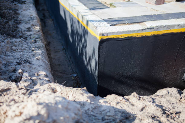 Professional Emergency Waterproofing technician working in Brownstown, PA